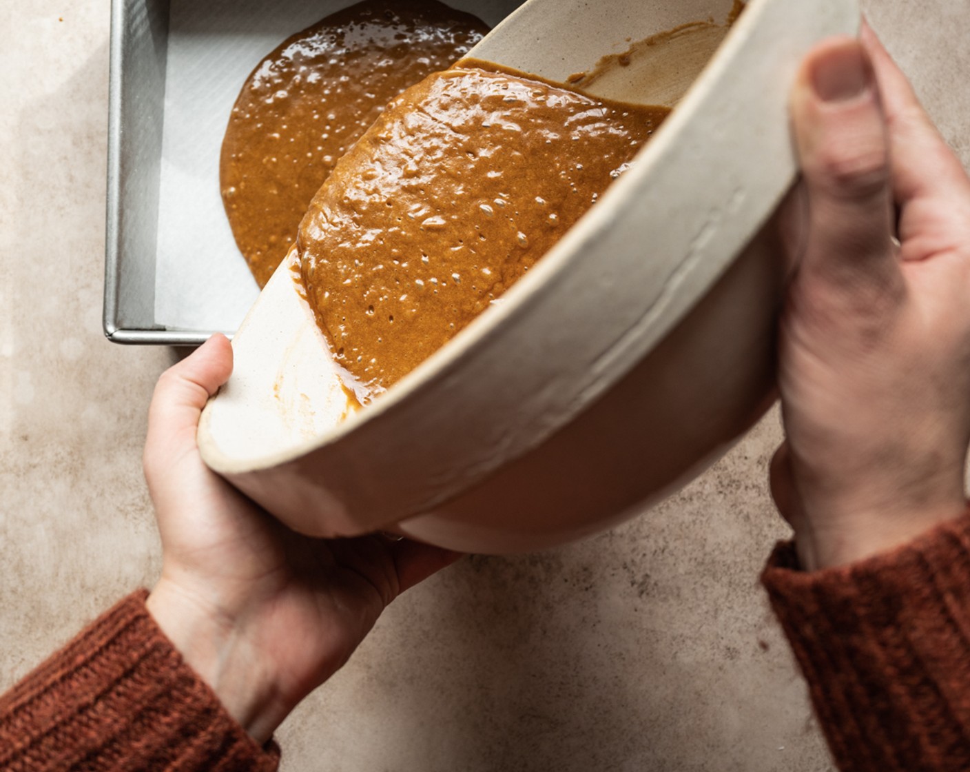 step 6 Pour the batter into the prepared baking dish and bake for 30-35 minutes. The top will be a deep brown and a toothpick inserted into the center will come out clean.