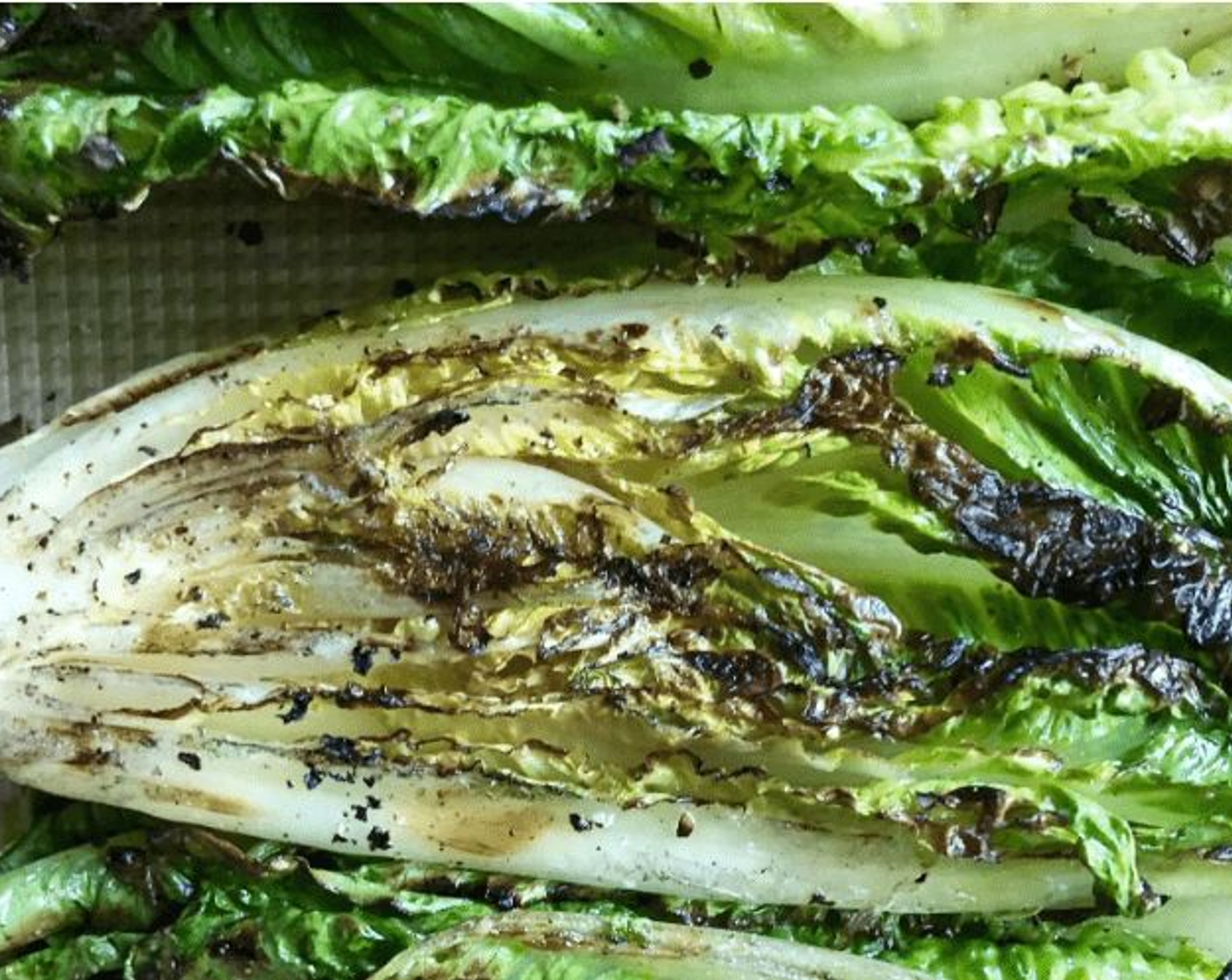 step 7 Grill the romaine lettuce cut side down for about 3-4 minutes just on one side or until grill marks appear.