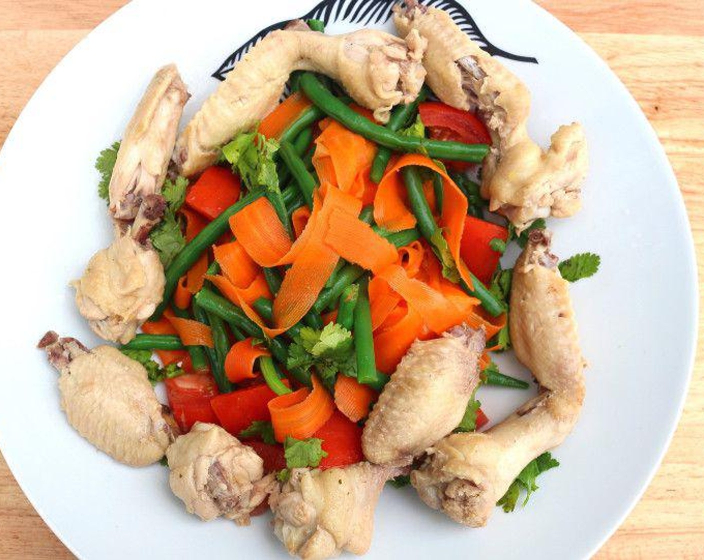 step 6 Place the wings and veggies / “noodles” in a deep serving bowl, cover with the chicken soup. Serve and enjoy!