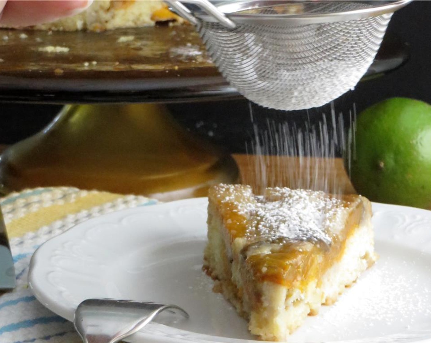 step 6 Just before serving, pour Powdered Confectioners Sugar (1/3 cup) into a fine sieve, and tap the side of the sieve with your hand to sprinkle sugar over the cake. Enjoy!