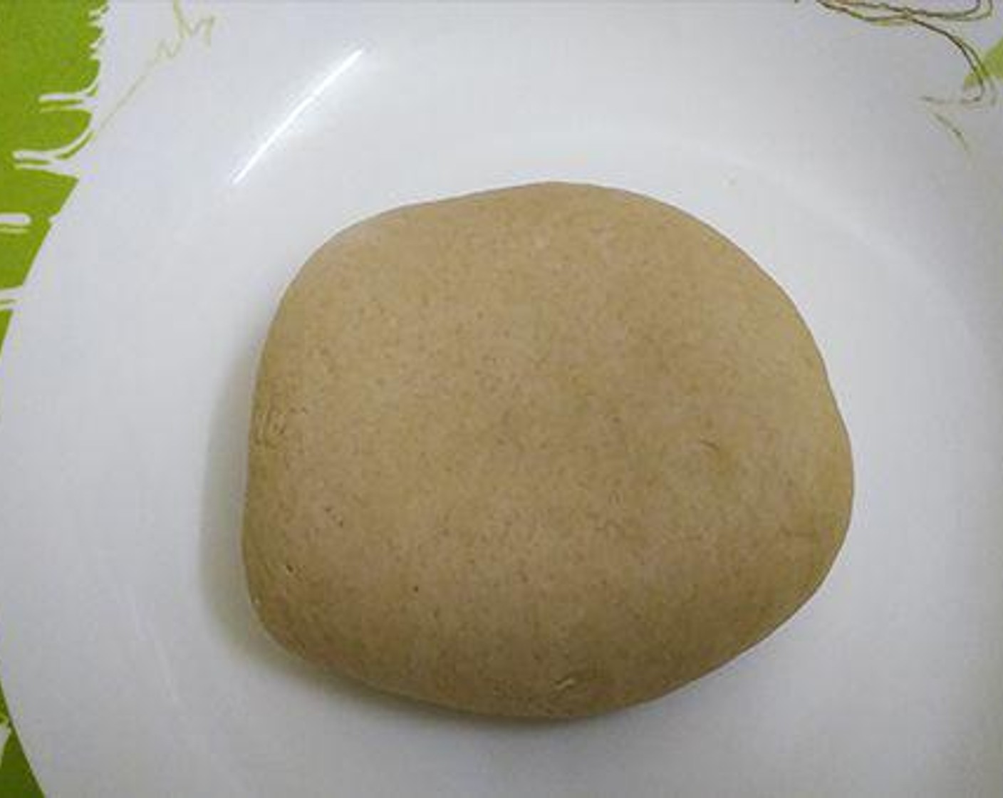 step 1 In a large bowl, add Whole Wheat Flour (2 cups), Water (to taste), Oil (1 Tbsp), Salt (to taste) and combine to make a smooth dough. Let it rest.