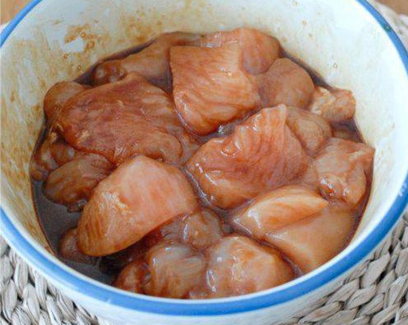 step 1 Cut Chicken (14 oz) into small pieces, use Soy Sauce (to taste), Salt (to taste), and Granulated Sugar (1 tsp) to marinate the chicken for 30 minutes.