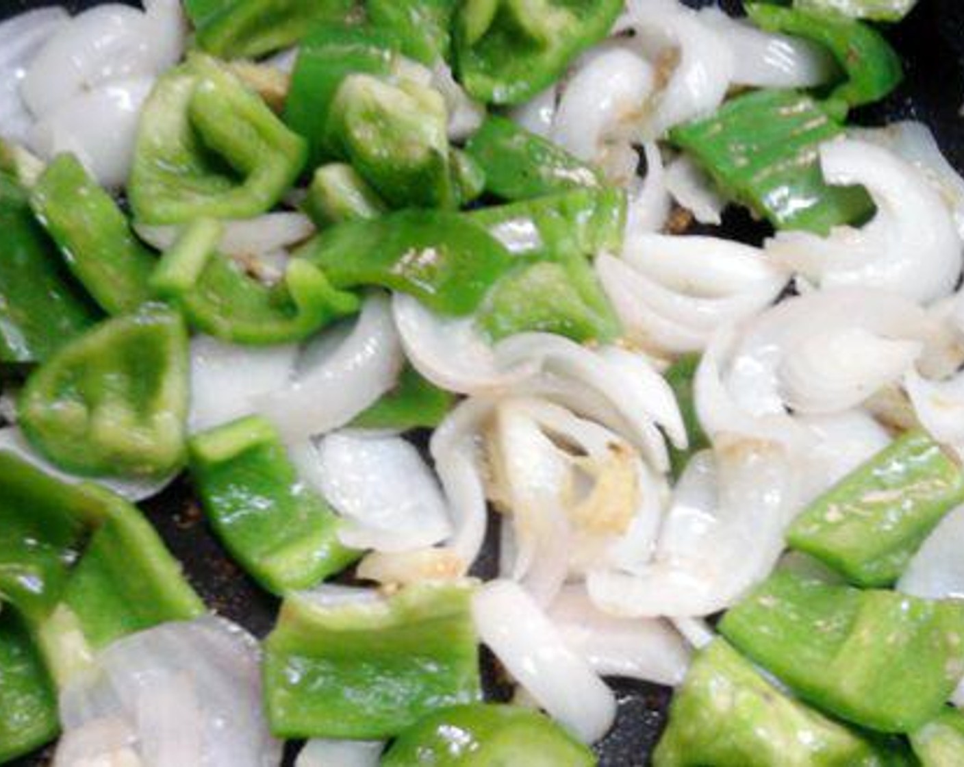 step 2 Pour Vegetable Oil (1/4 cup) to a pan and shallow fry the marinated soya chunks till it becomes slightly golden brown in color. Remove from pan and keep aside.