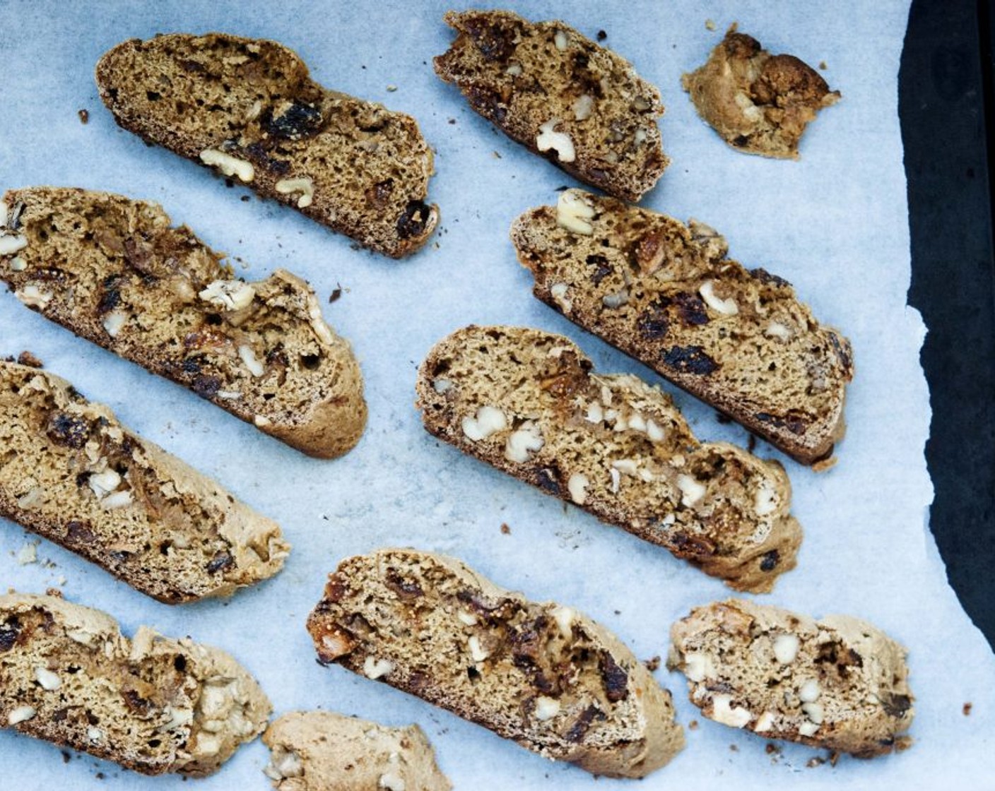 step 8 Place slices cut side up, on sheet. Bake for 7 minutes, flip biscotti and bake 7 minutes more.