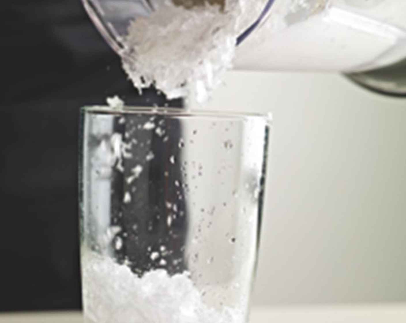 step 2 Pour the ice into tall glasses until they are all half full.