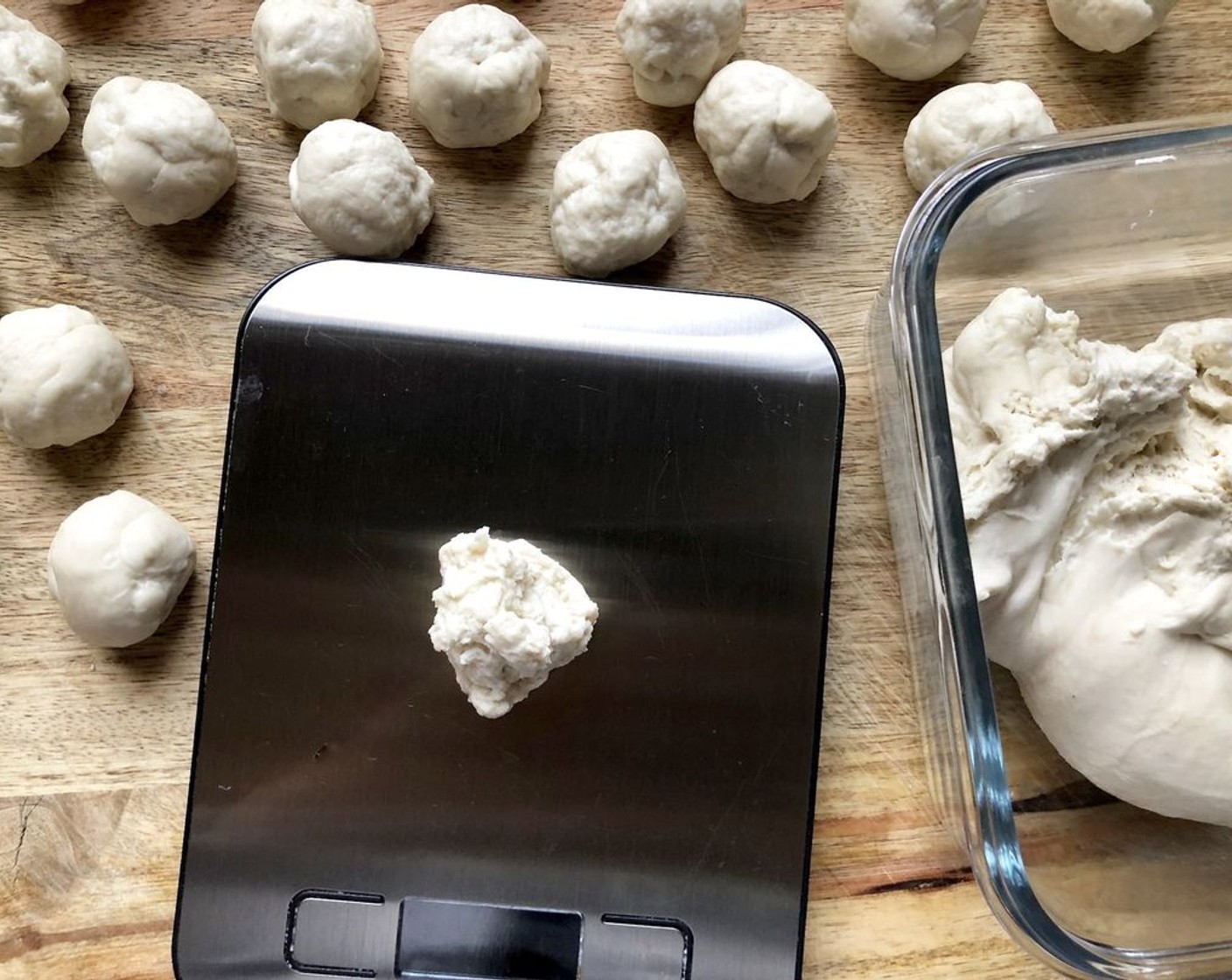 step 2 Roll cherry-size pieces of Pizza Dough (1 lb), about 1/2-ounce each, into balls.