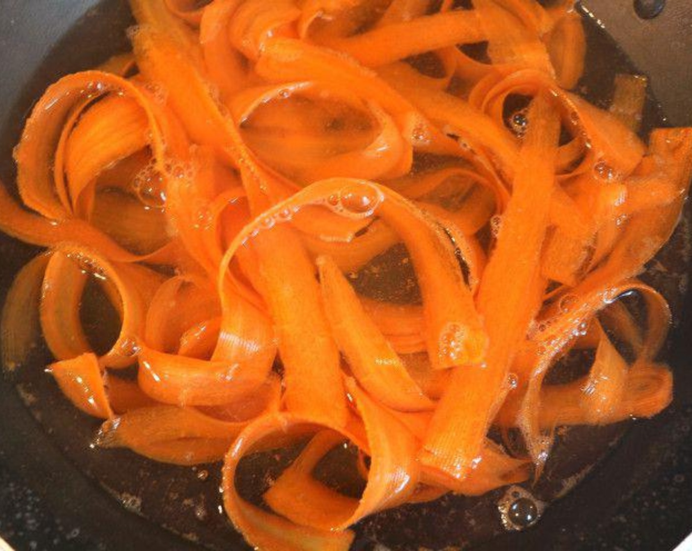 step 4 Blanch the carrots briefly, drain, shock in ice water.