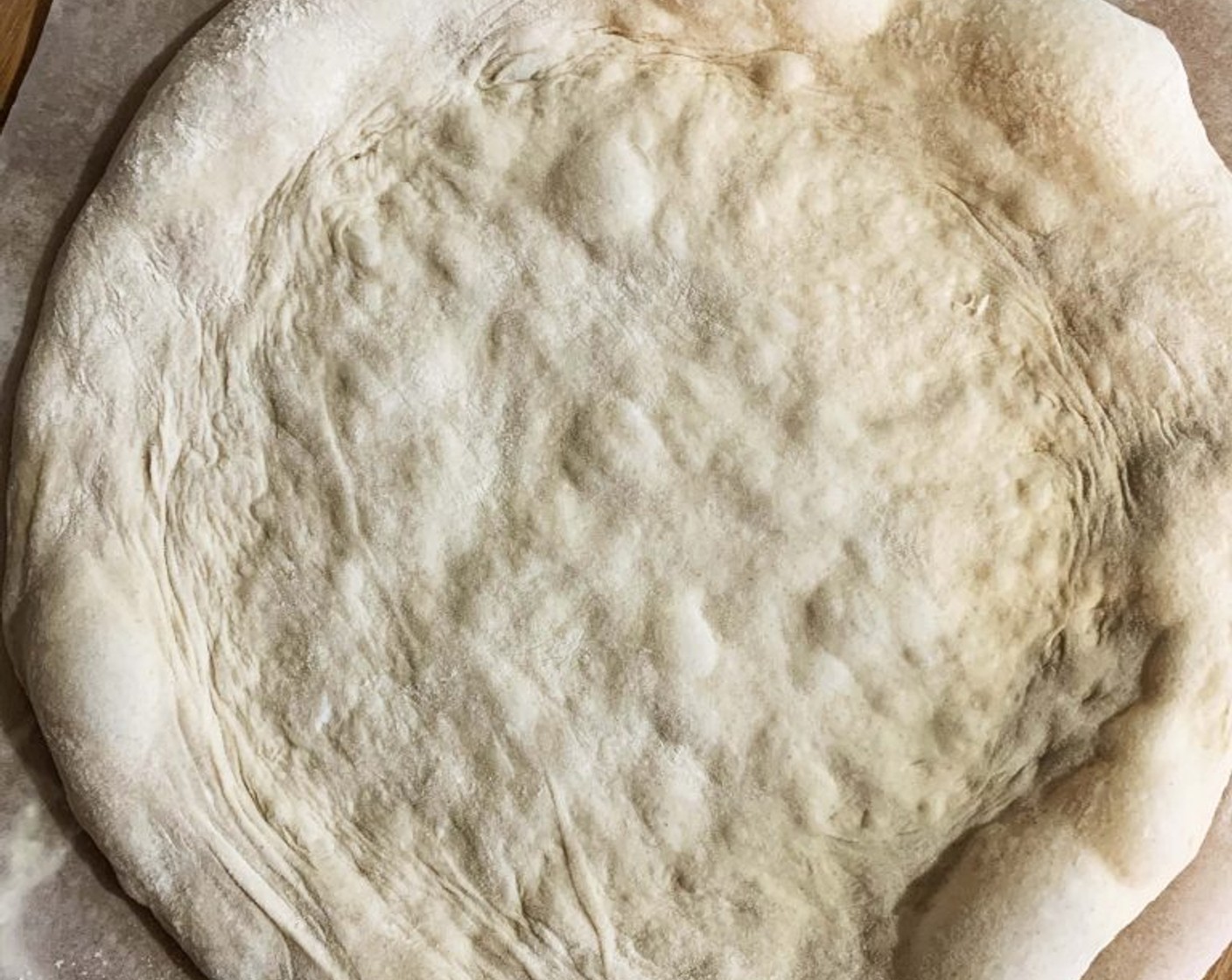 step 9 Roll out the dough on a floured surface, with gentle movements from the center towards the edges. Make sure to push the air inside the dough to the borders.