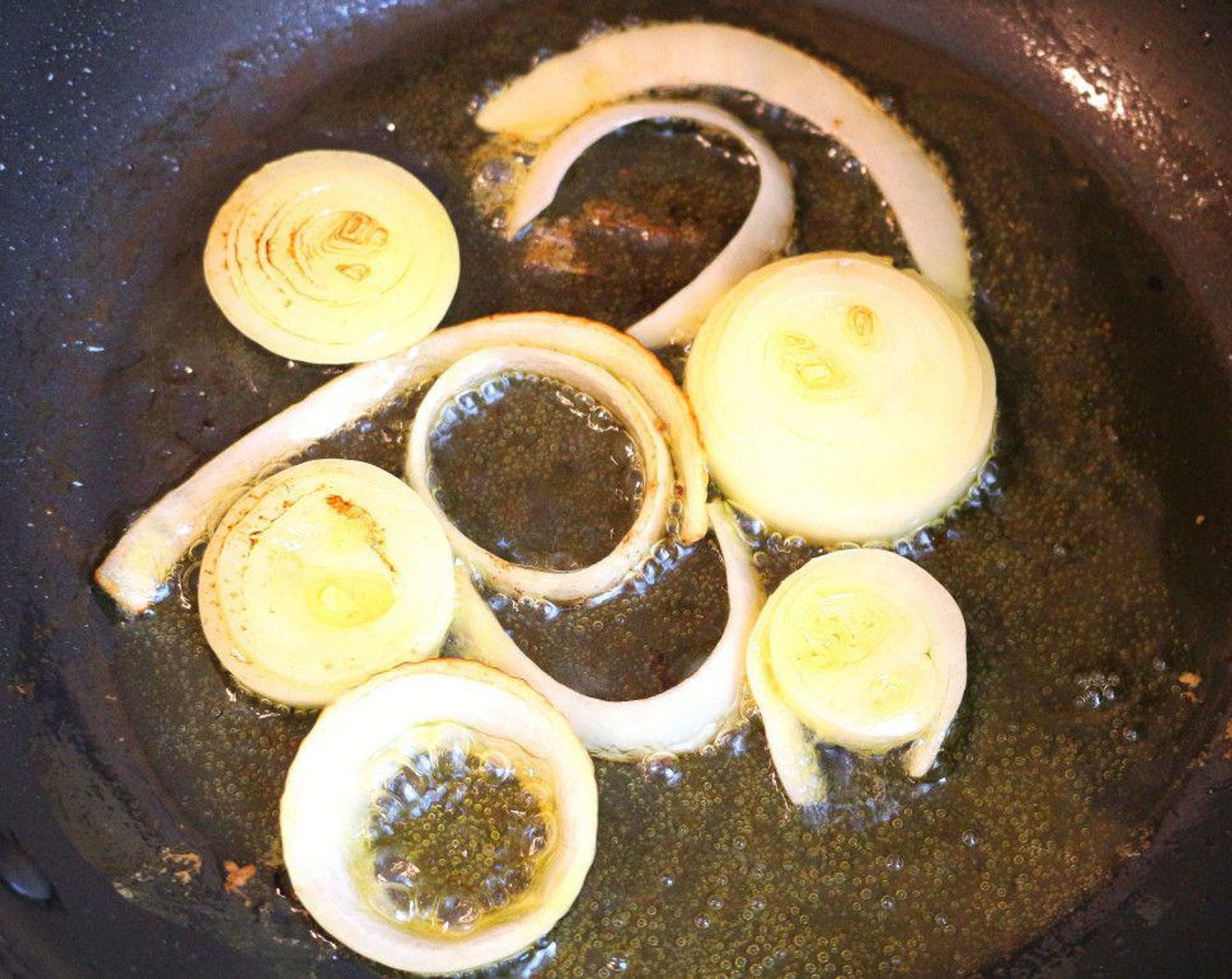 step 6 Sauté Onion (1) rings until starting to caramelize, then season with Kosher Salt (to taste) and Cayenne Pepper (to taste). This step might take a while.