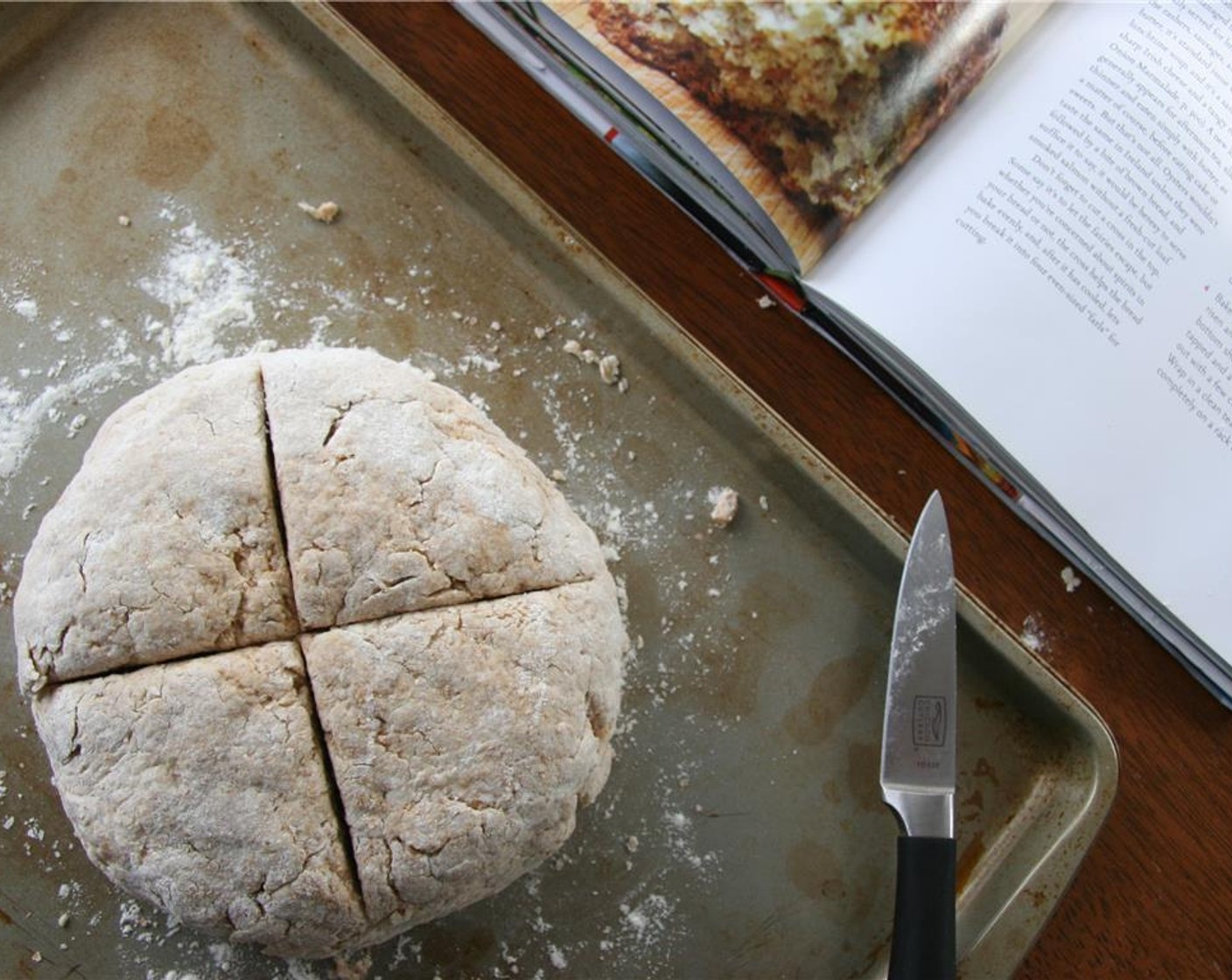 step 5 Shape into a round shape and use a sharp knife to slice a large X about an inch deep across the entire surface.