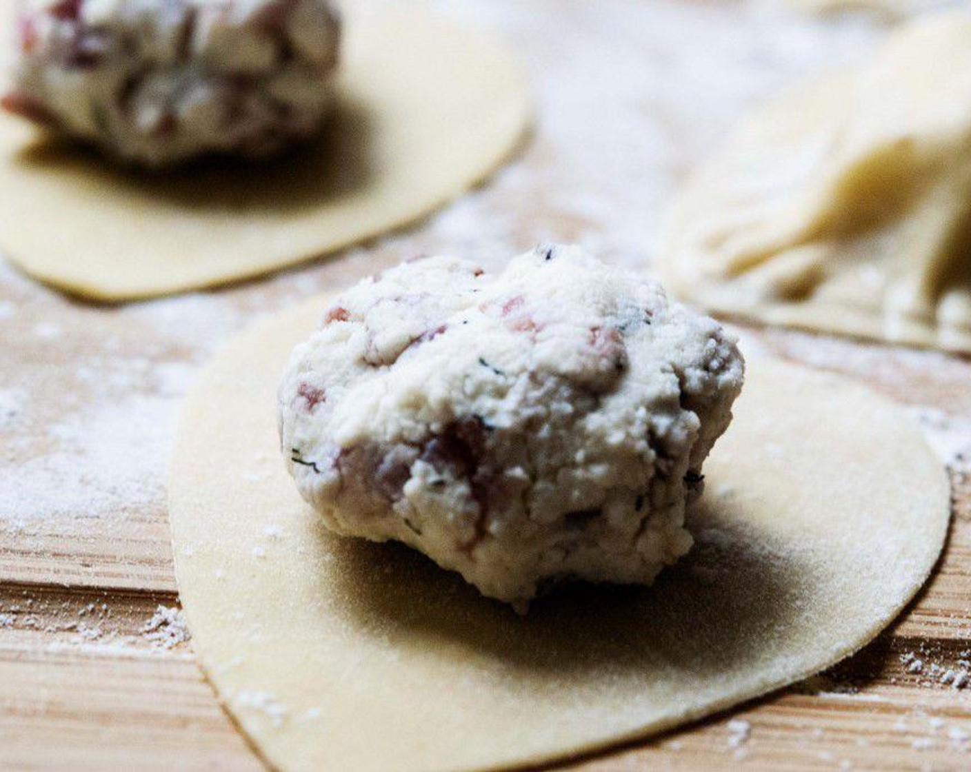 step 5 In the center of half of the hearts, place a teaspoon of filling,