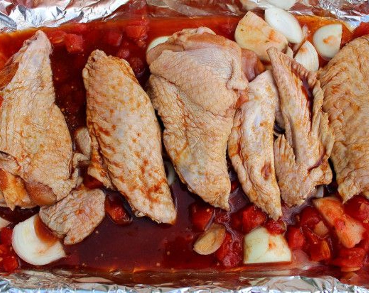 step 3 In a baking pan, mix 3 cups of White Wine (3 cups), 6 cups of Chicken Stock (6 cups), 2 cups of Tomatoes (2 cups), Onions (2).