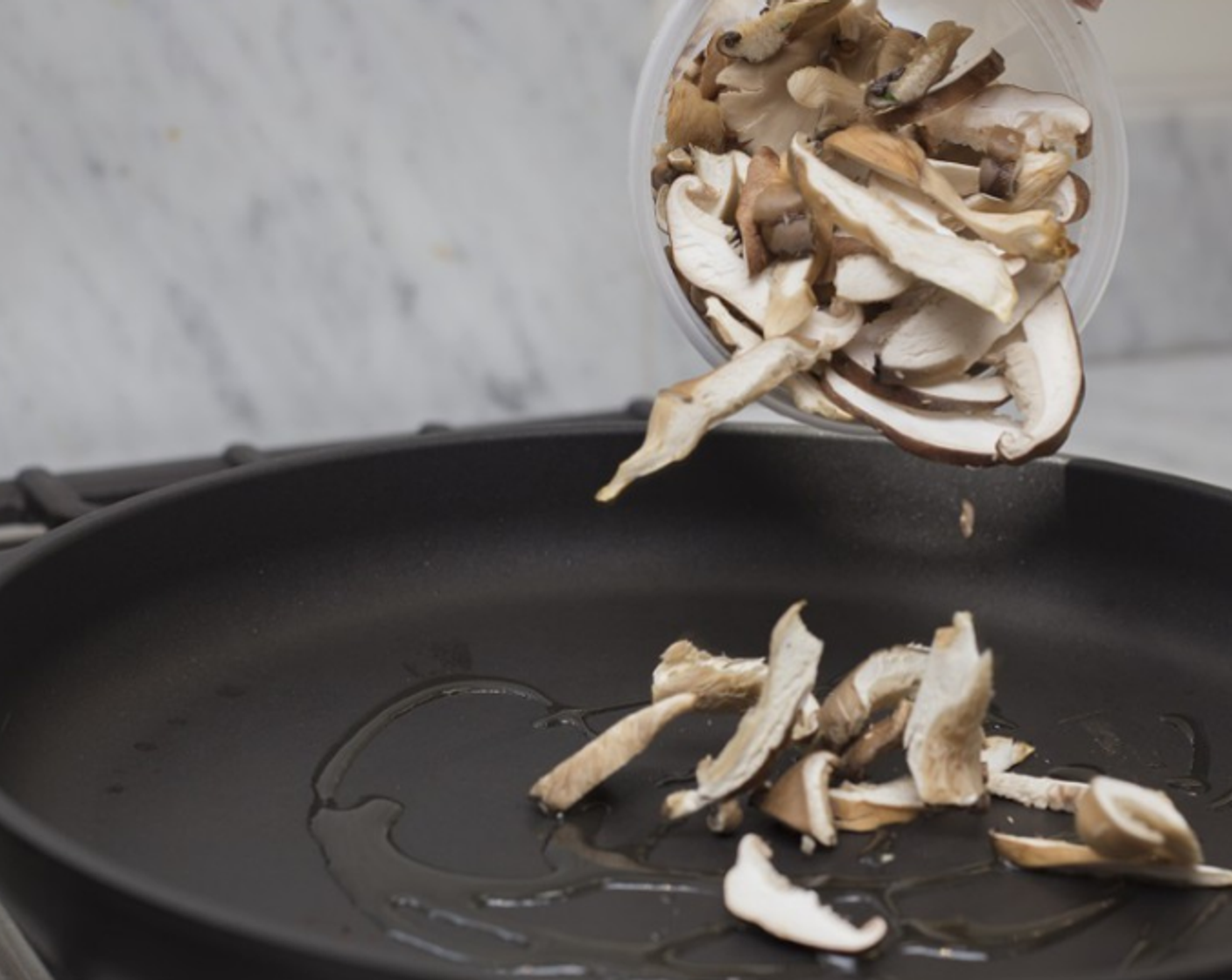 step 9 Add mushroom caps in a single layer. Cook without stirring until the mushrooms begin to brown on the first side. Turn or stir the mushrooms, and cook until they are brown all over. Transfer to a paper towel.