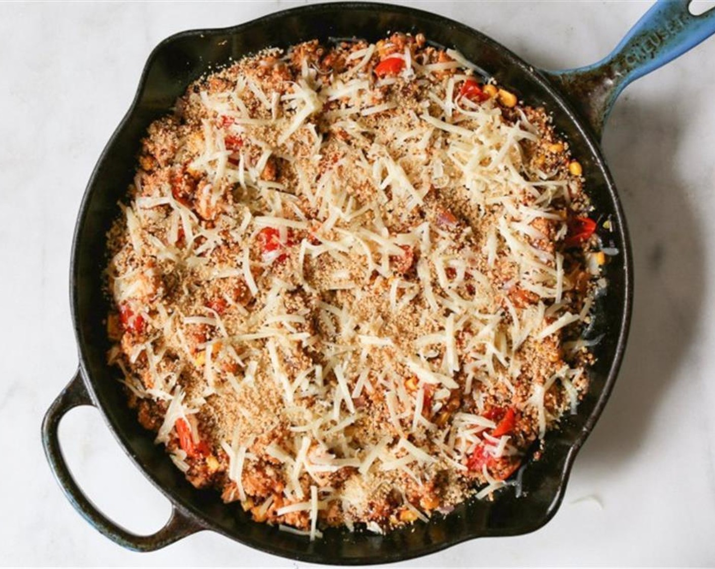 step 5 Turn off the heat and add the cooked quinoa, Chicken Breasts (2 cups), Barbecue Sauce (1/2 cup) half of Monterey Jack Cheese (1 1/2 cups). Stir until everything is well combined. Top with Whole Wheat Panko Breadcrumbs (3 Tbsp) and remaining cheese.