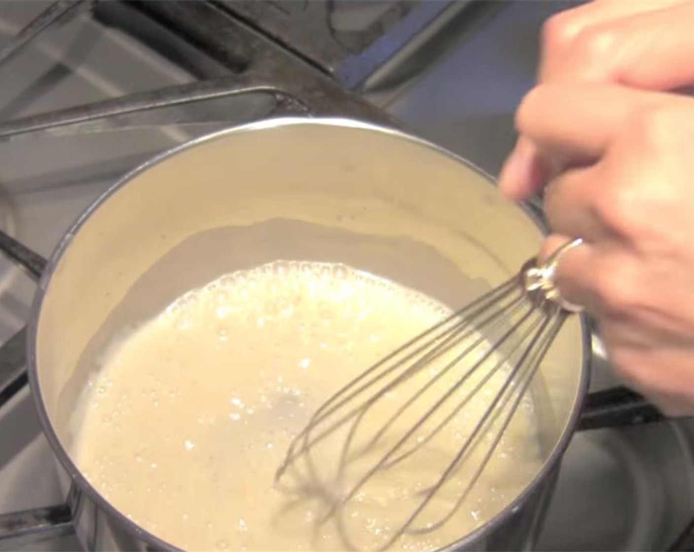 step 1 For the enchilada sauce, in a 2 quart saucepan, add the Vegetable Oil (3 Tbsp) over medium high heat. When the oil is hot, lower the heat to low, and add the All-Purpose Flour (3 1/2 Tbsp). Mix constantly with a wire whisk for 1-2 minutes.