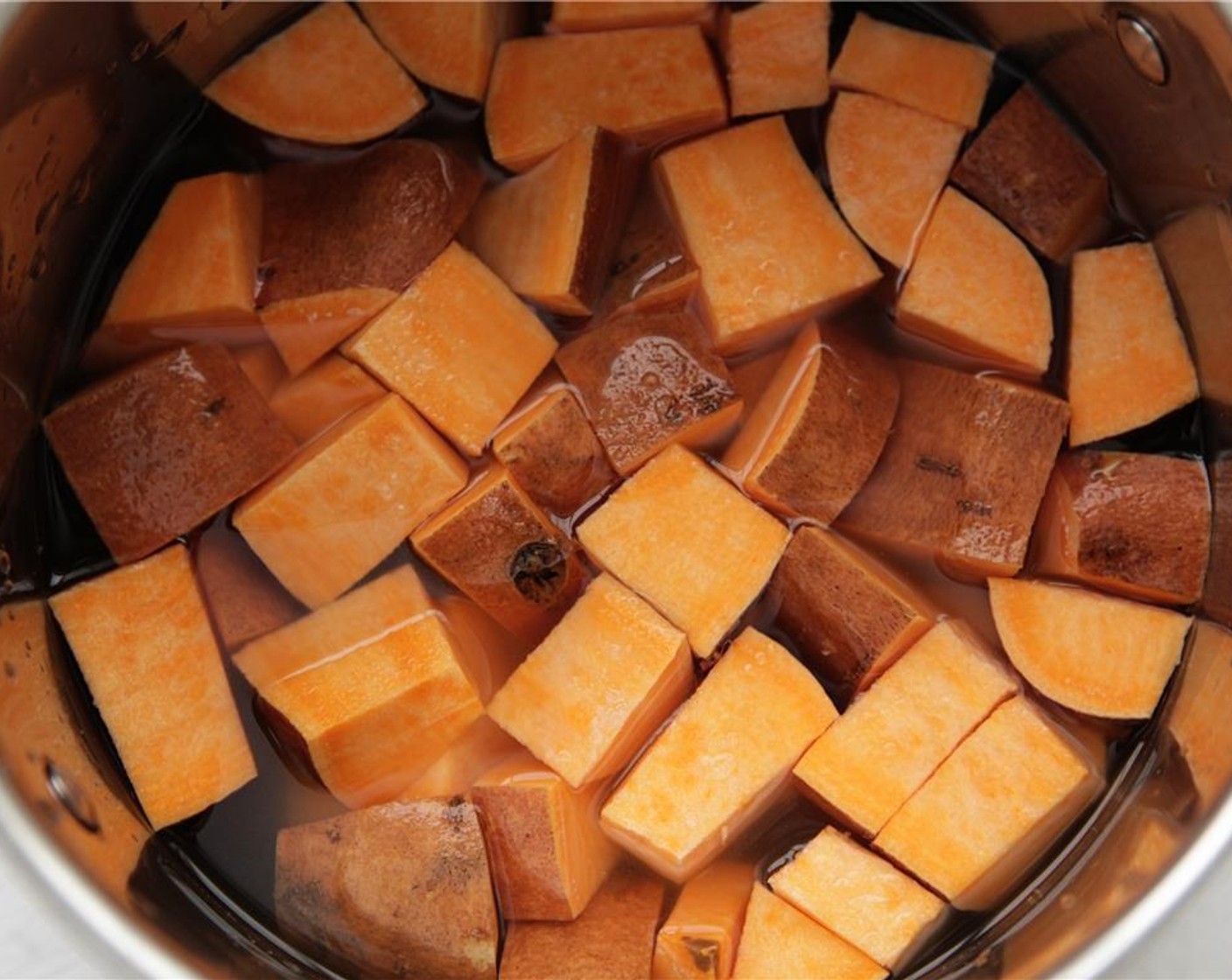 step 2 Place the diced sweet potato in a small saucepot, and cover with water. Add Kosher Salt (to taste). Bring to a boil, then reduce heat to a simmer. Cook until very tender, 20-30 minutes.