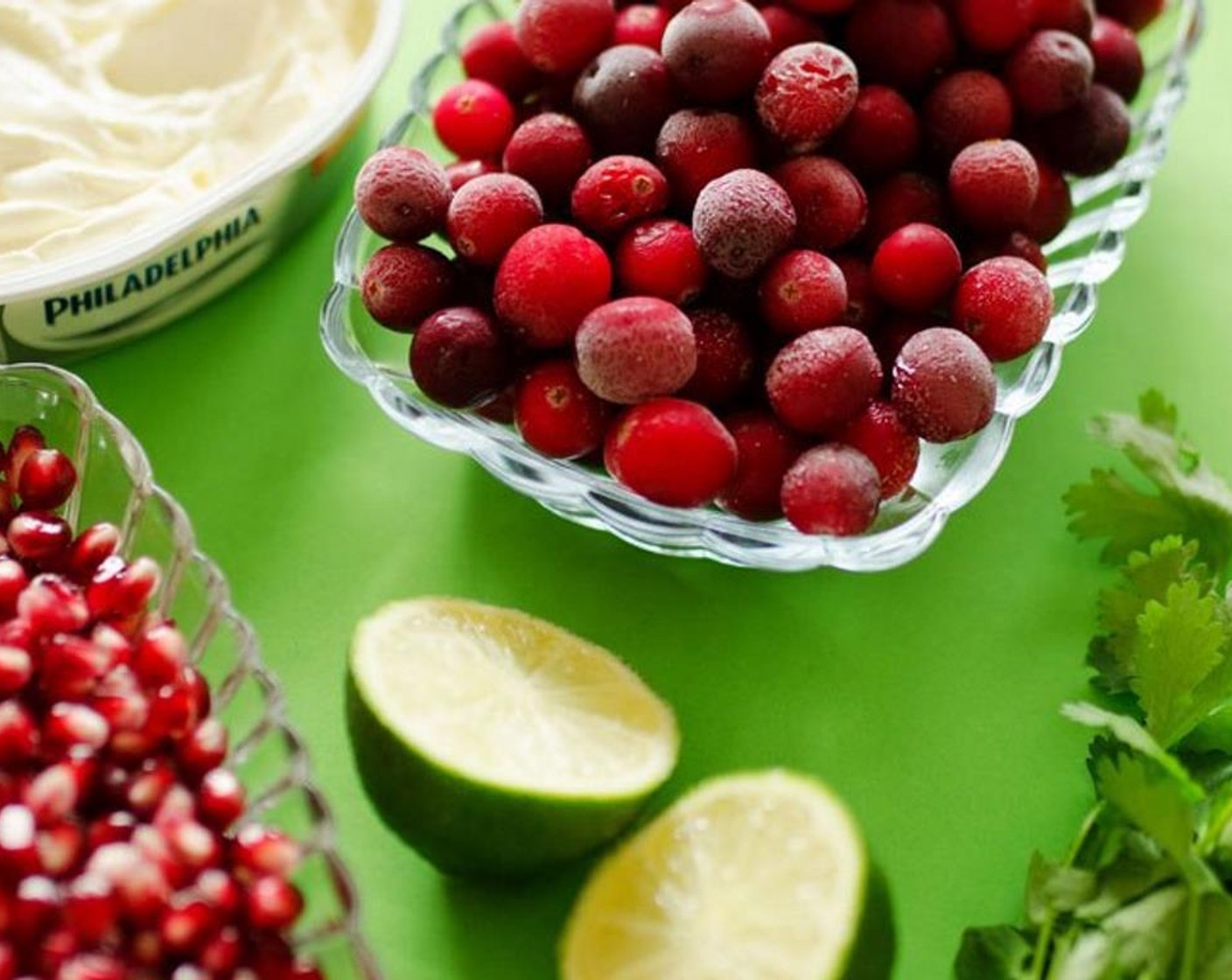 step 2 In a medium bowl, toss together Frozen Cranberries (2 cups), Brown Sugar (4 Tbsp), Jalapeño Pepper (1), Garlic (1 clove), Lime (1), Ground Cumin (1/4 tsp), Salt (1 pinch) and Ground Black Pepper (1 pinch).