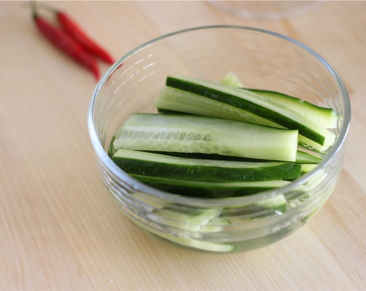 step 2 Place cucumber in a small bowl and cover with Gin (2 fl oz) for one hour.
