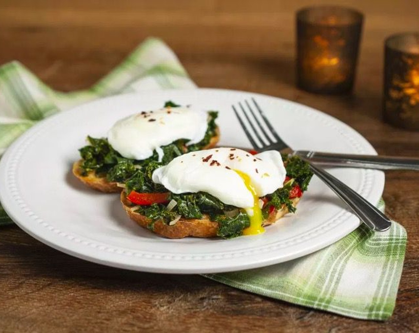 step 5 Toast Italian Bread (4 slices) and butter if desired, then top with a generous portion of sauteed kale and a poached egg. Sprinkle with Crushed Red Pepper Flakes (to taste) if desired. Serve immediately. Enjoy!