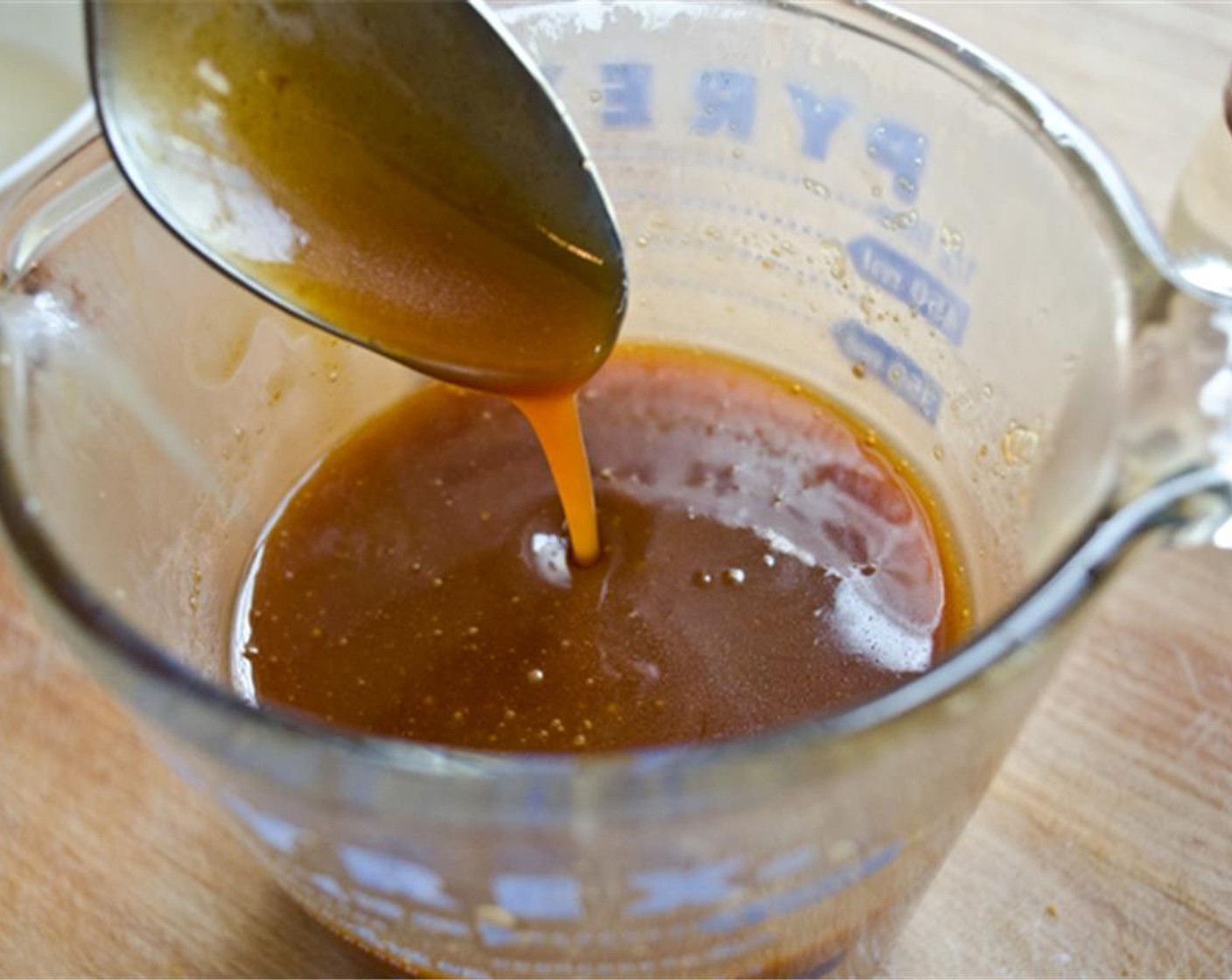 step 16 Add the heavy cream to the caramel, one tablespoon at a time. After all the cream has been added, stir to incorporate them. Then, add the Unsalted Butter (1 Tbsp) the mixture seems too thick, add more cream. Store in the refrigerator until ready to use.