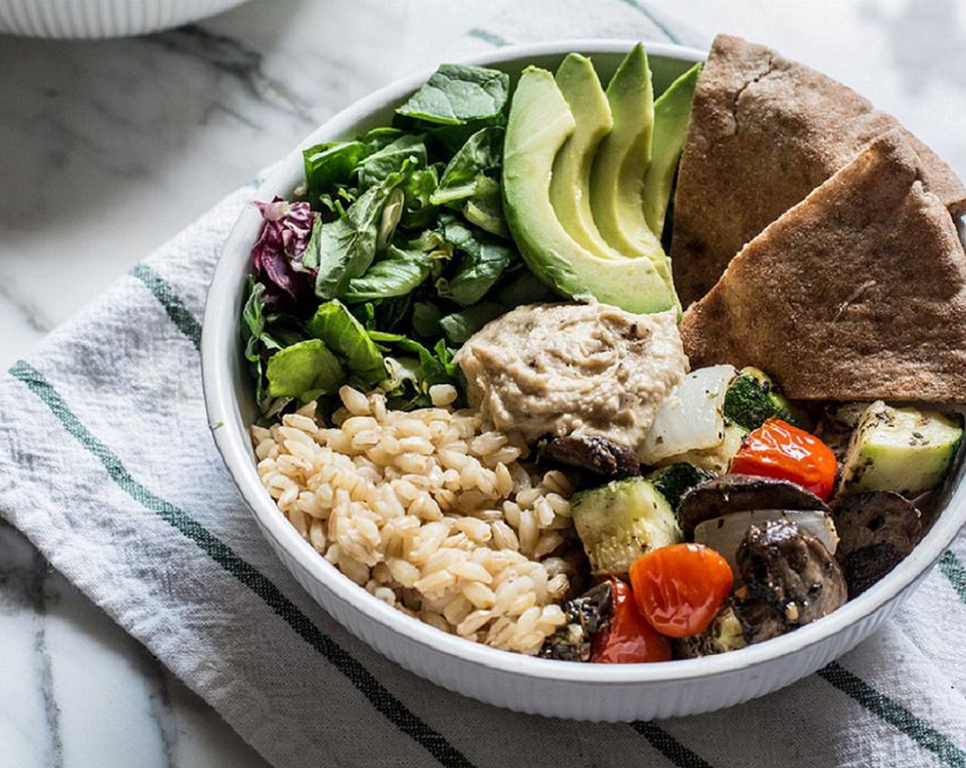 Roasted Veggie Grain Bowl with Avocado and Hummus