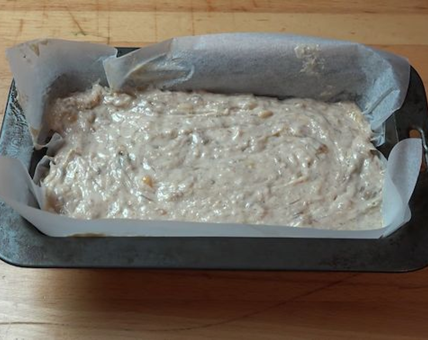 step 5 Pour your batter into the baking pan and smoothen out the top of the batter. Place into your oven and bake for 45-50 minutes or until a skewer inserted into the center of the banana bread comes out clean.