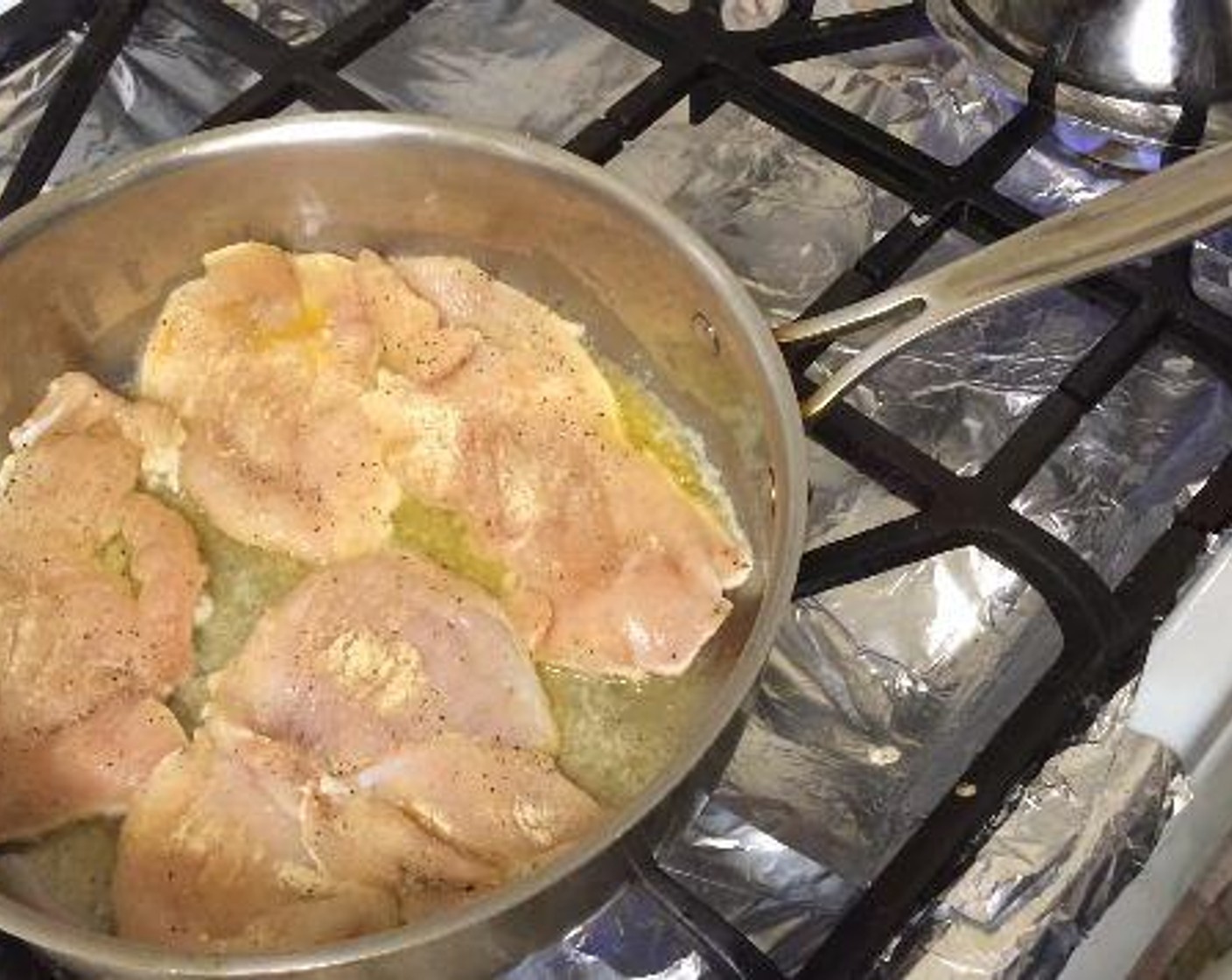 step 3 In a pan with high sides, over medium high heat, melt the Butter (1/4 cup). Add the chicken and cook for about 4 minutes on each side until cooked through. Remove chicken from the pan and cut into bite size pieces.