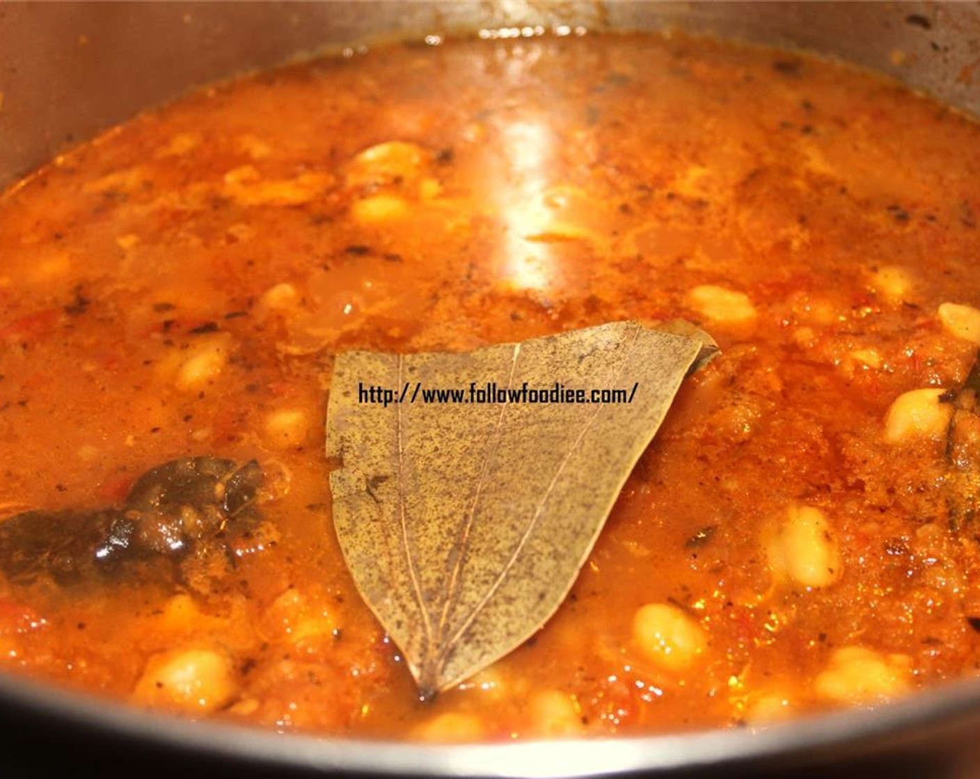 step 9 Add Kasoori Methi Powder (1 tsp) and juice from Lemon (1) and stir. Cook on low flame until the oil separates from the curry.