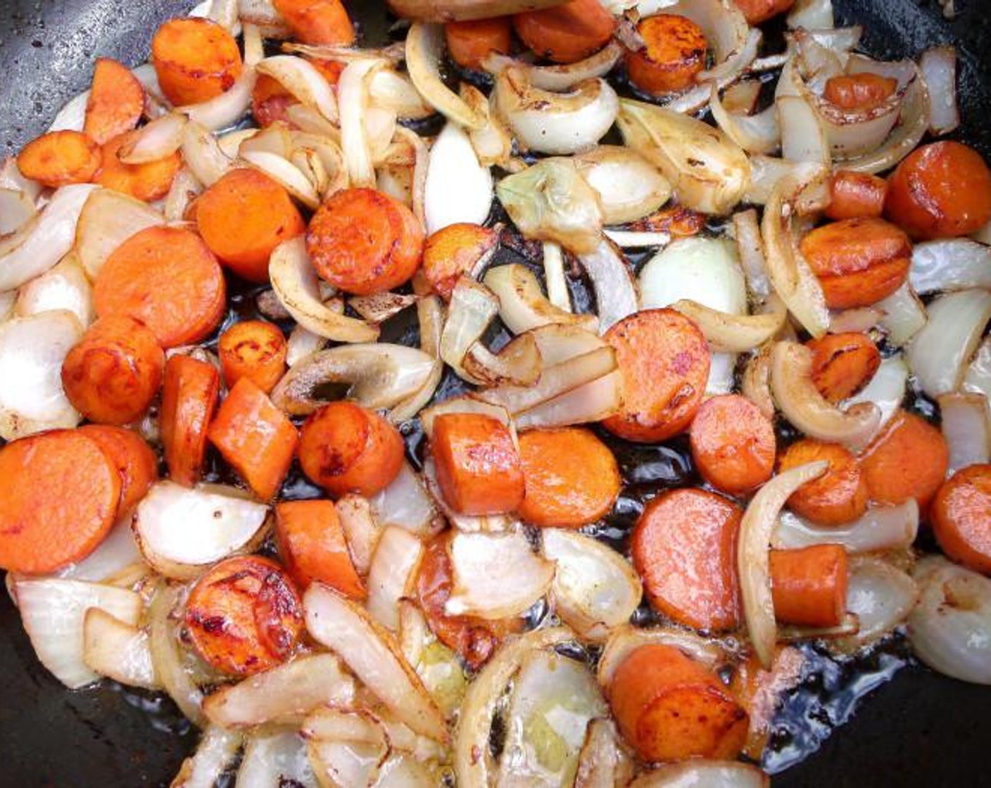 step 3 Cut Carrots (2) and Onions (2) into large dice, saute until caramelized.