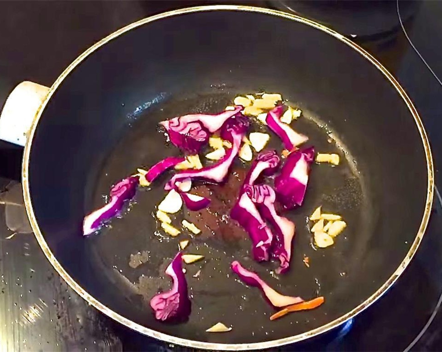 step 2 Brown the ginger and garlic in a pan with Coconut Oil (2 Tbsp). Add carrots, purple cabbage, red pepper, and kale, and saute for about 1-2 minutes.