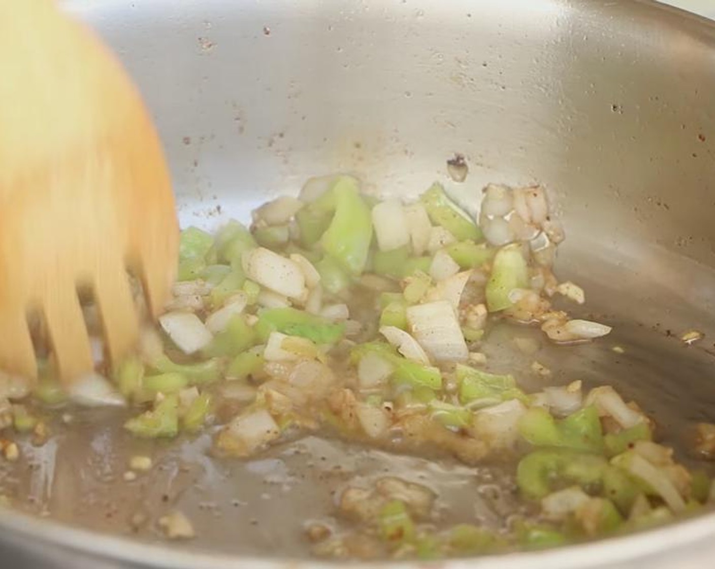 step 6 Hand chop Onion (1/4) and Cubanelle Pepper (1/2) and add to the pan. Add Distilled White Vinegar (1 tsp) and cook for 2-3 minutes, or until soft.