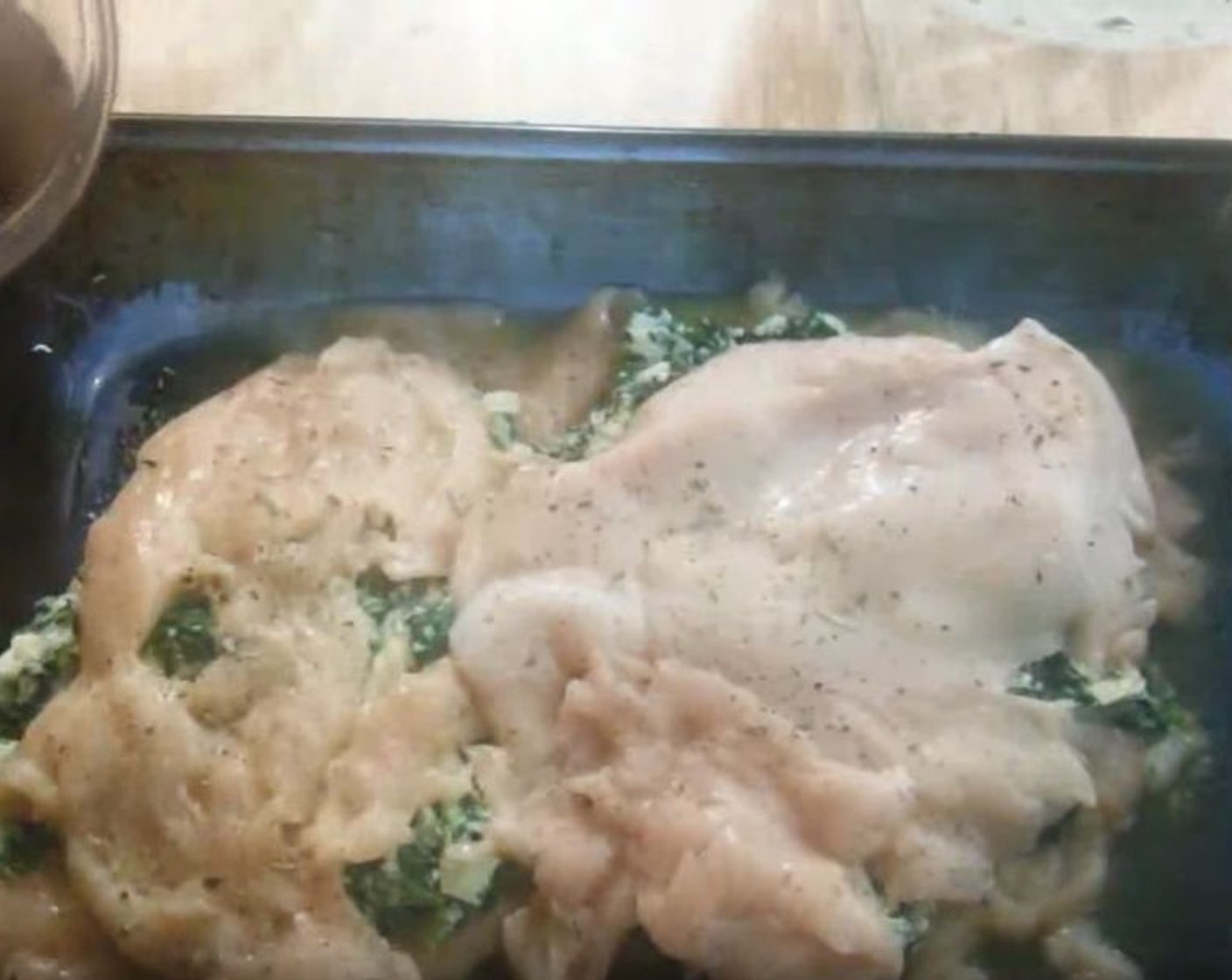 step 5 Spread half of the spinach mixture over each chicken piece, then top with the remaining breast halves. Season with Salt (1/2 tsp), Ground Black Pepper (1/2 tsp), Dried Rosemary (to taste), and Dried Thyme (to taste).