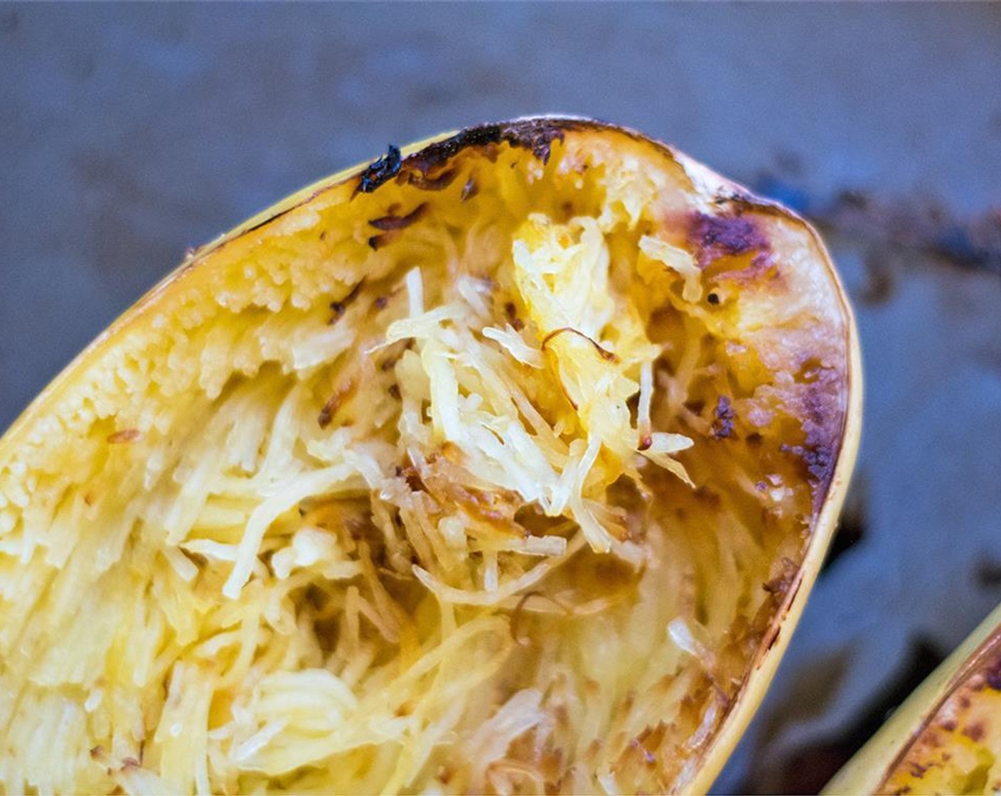 step 2 Cut Spaghetti Squash (1) in half lengthwise, remove all seeds, and place on baking sheet face down. Bake for 40 minutes or until tender.