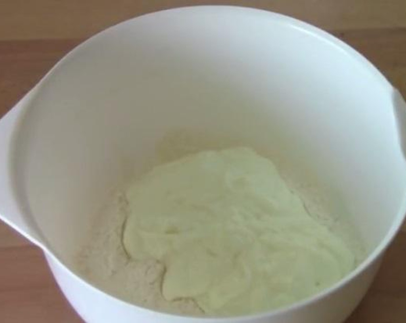 step 1 Into a mixing bowl add and mix the Self-Rising Flour (1 cup), Plain Greek Yogurt (1 cup) and Salt (to taste).
