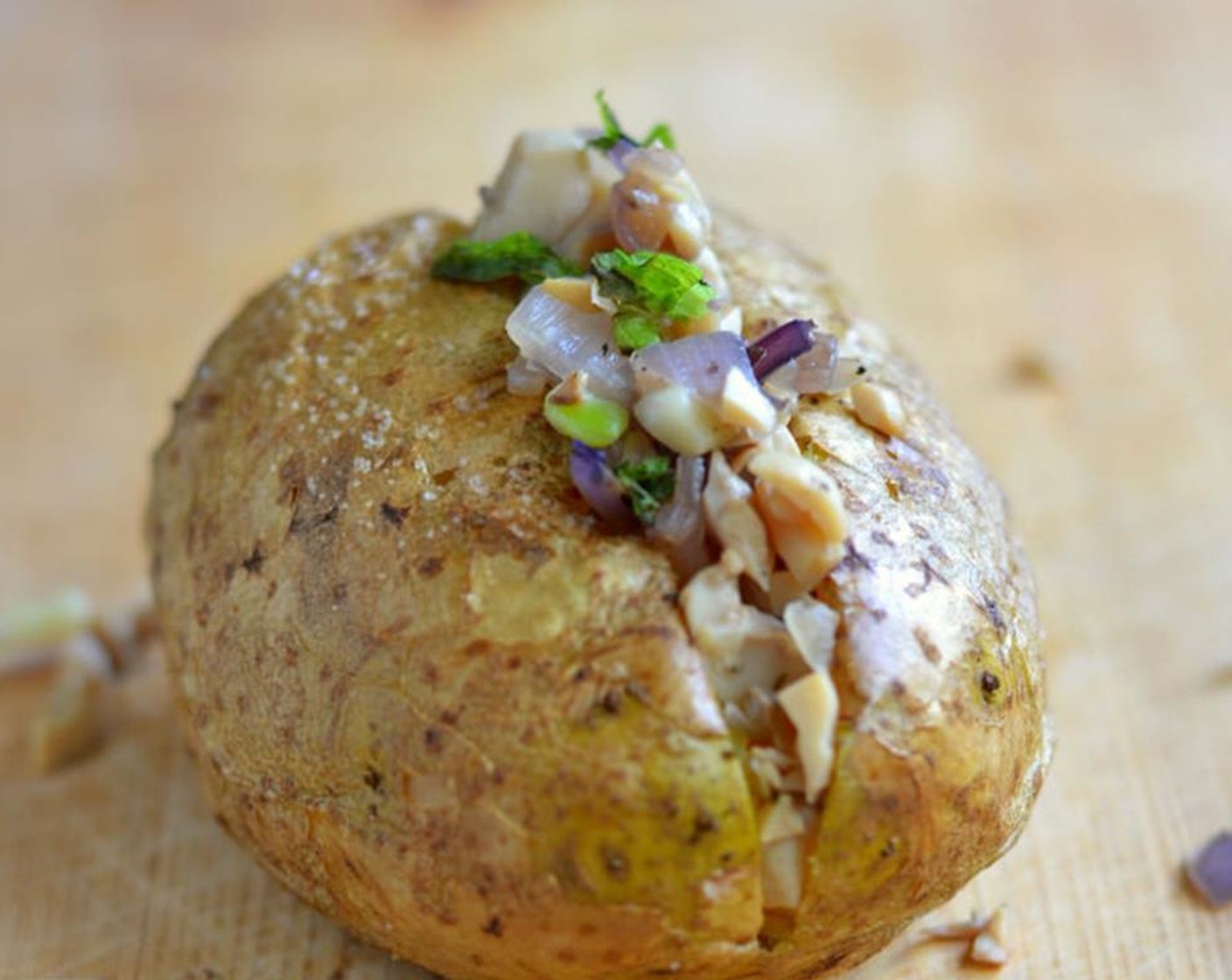 step 8 Spoon a generous amount of onion and mushroom mixture into the baked potato. Serve and enjoy!