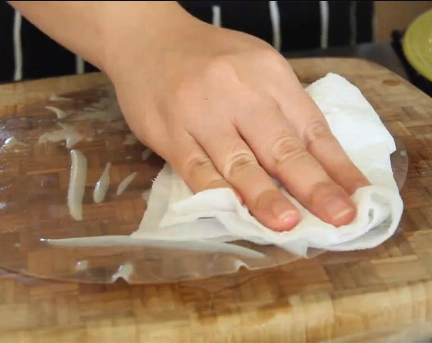 step 12 Then spread the sheet of rice paper out on a cutting board and lightly pat dry with a paper.
