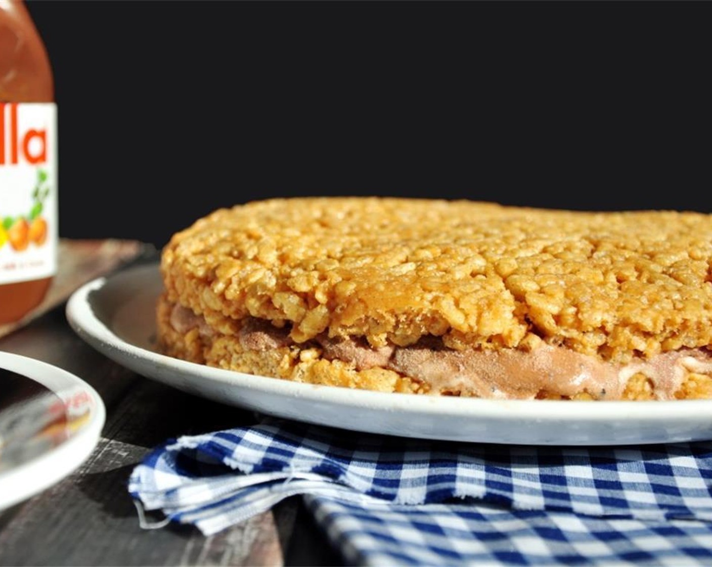 step 6 Top with the other part of Rice Krispie mixture to make one very large sandwich in a cake shape. Freeze for 2 hours or until firm.