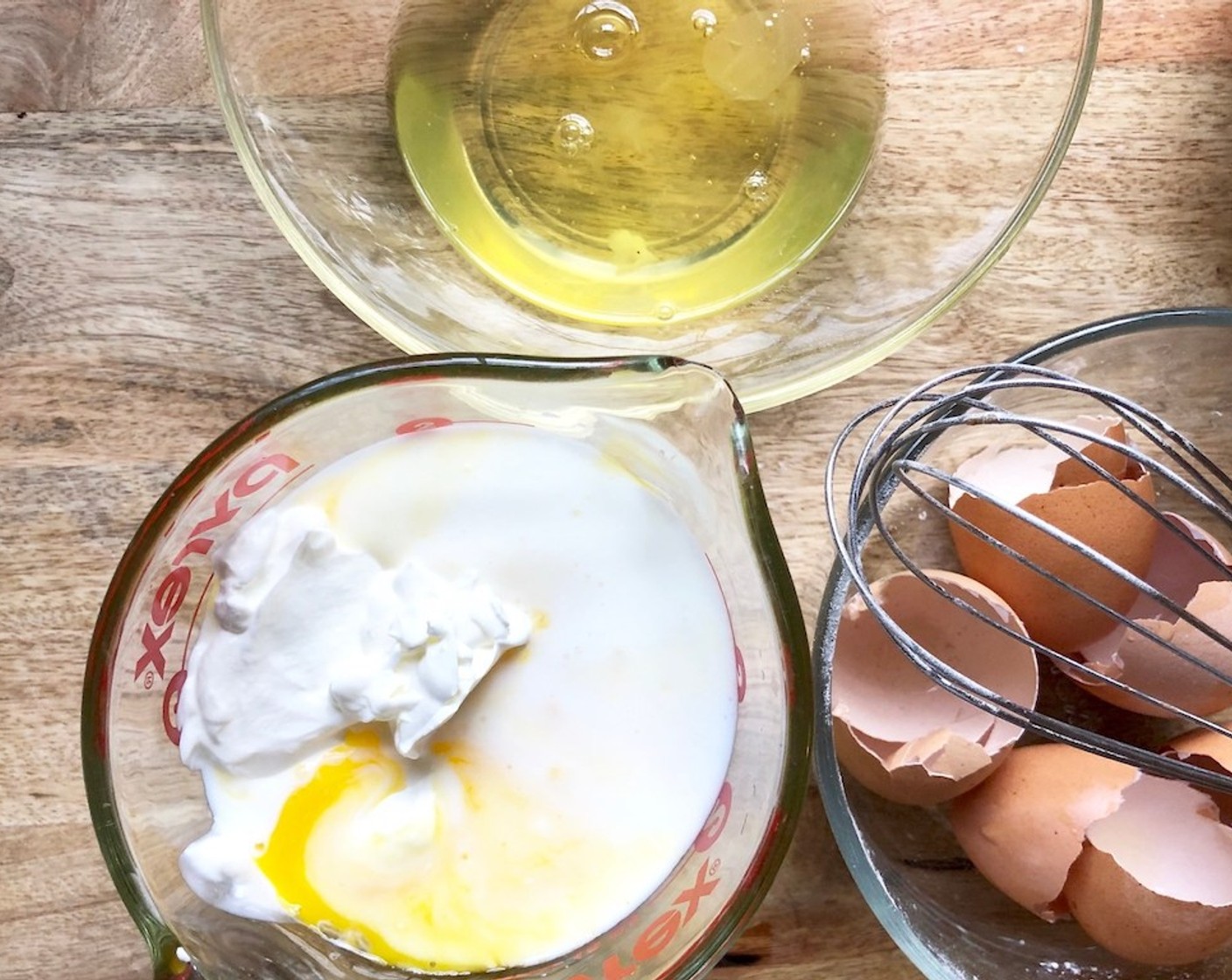 step 4 In another container, lightly whisk the Eggs (3), then whisk in the Buttermilk (1 1/3 cups) and Sour Cream (1/2 cup).