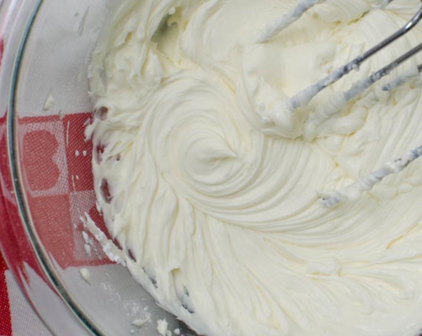 step 4 Use a hand mixer on medium high speed to combine and whip the ingredients together. Continue to whip until light and fluffy. Set aside.