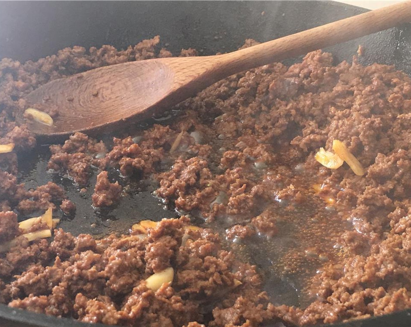 step 5 In a skillet over medium heat, cook the beef until browned. Make sure to break it up as it browns.