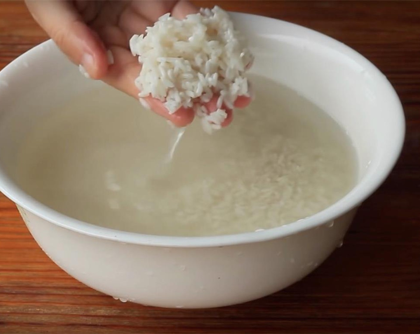 step 1 Soak the Glutinous Rice (1 1/2 cups) with clean water at least for 24 hours. Move out and drain. Transfer the rice to a plate and flatten.