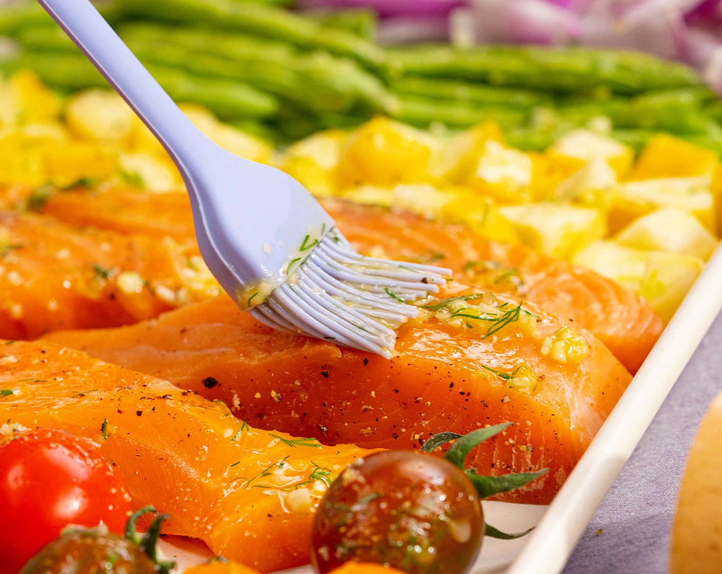 step 6 Brush the lemon-dill mixture on salmon and vegetables. Sprinkle Salt (1/2 tsp) and Ground Black Pepper (1/8 tsp) on top of the vegetables. Bake for 10-15 minutes, depending on the thickness of the salmon.