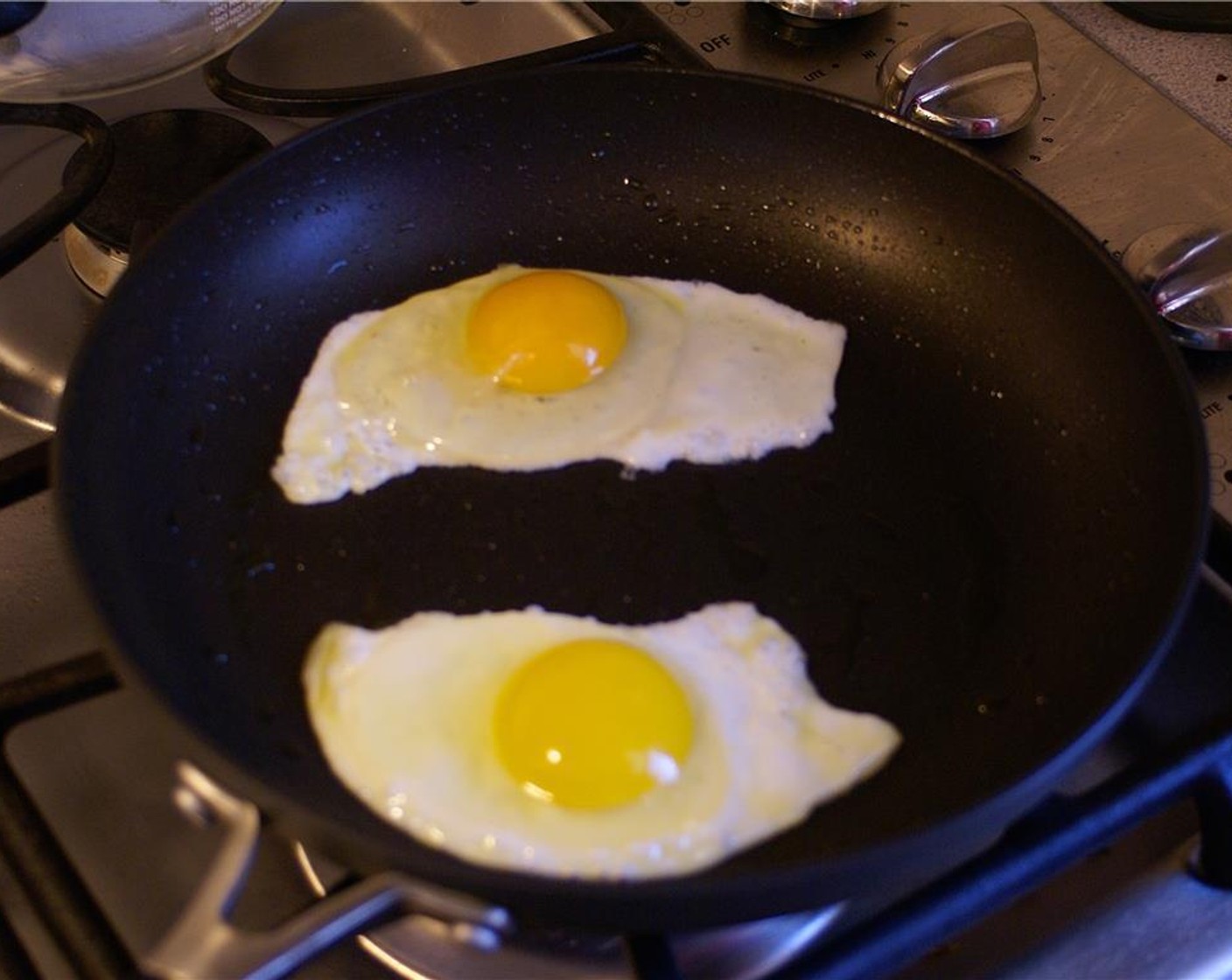 step 4 Fry the Eggs (4) to your liking. Season with Salt (to taste) and Ground Black Pepper (to taste).