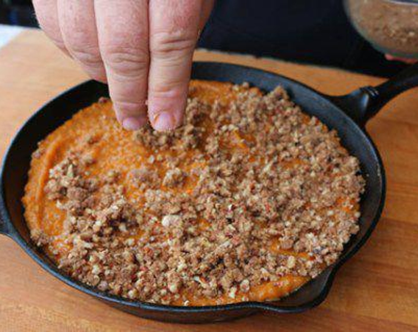 step 4 In a separate bowl add the Chopped Pecans (1 cup), Dark Brown Sugar (1/2 cup), All-Purpose Flour (1/4 cup) and Butter (1/4 cup). Stir to combine and sprinkle over potato mixture.