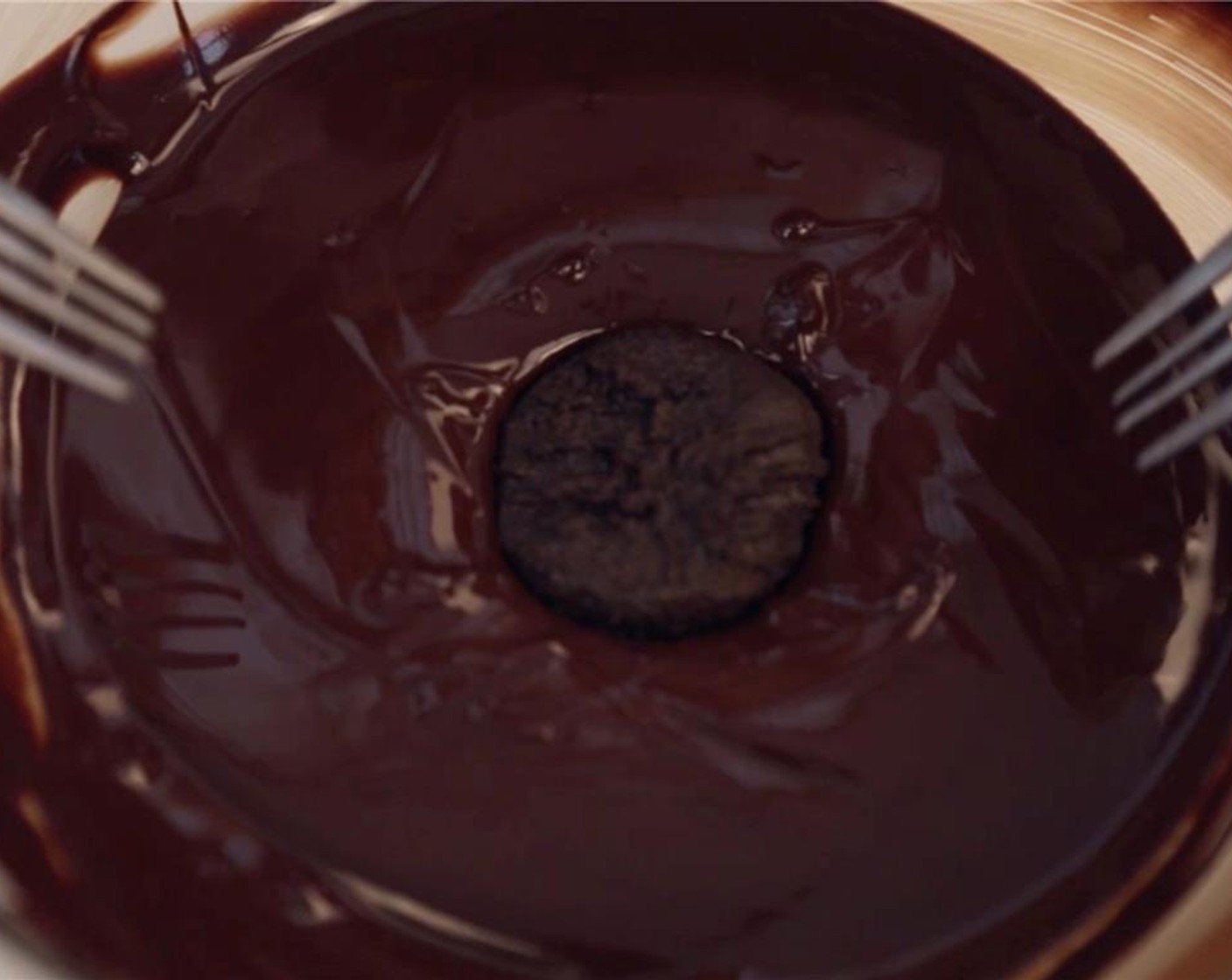 step 5 Melt the Dark Chocolate (3/4 cup) over a double-boiler until melted and smooth. Dip each truffle in the dark chocolate.