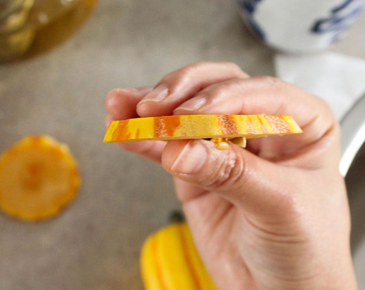 step 1 Slice the Delicata Squash (1) into 1/8 inch slices.