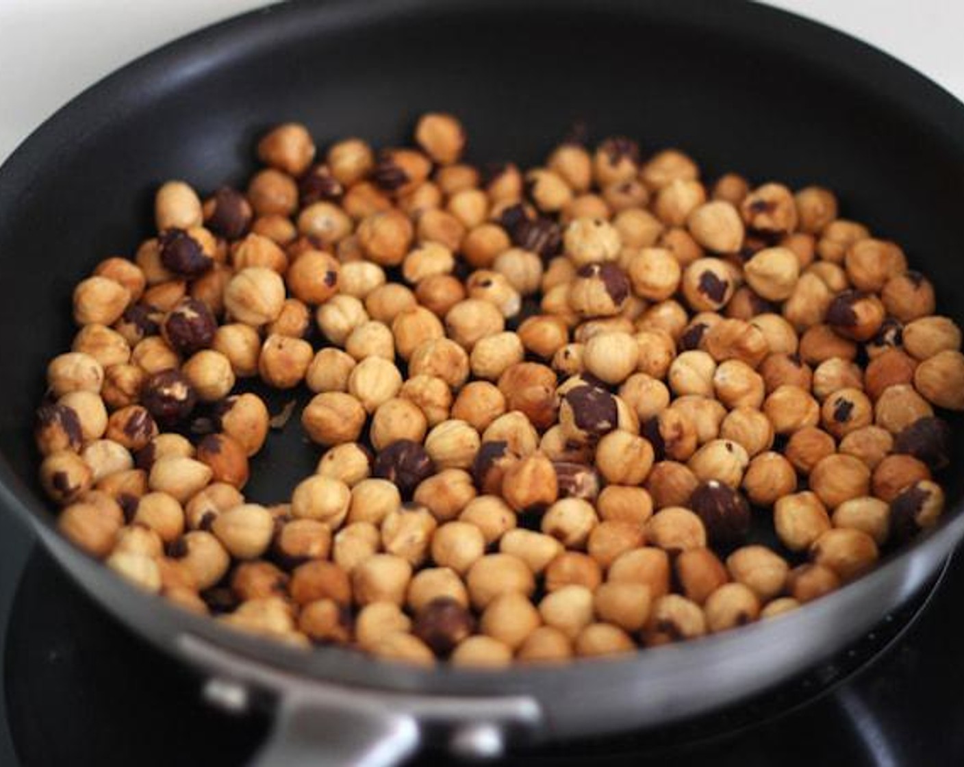 step 5 Put all the hazelnuts in a pan on medium heat for about 2-3 minutes.