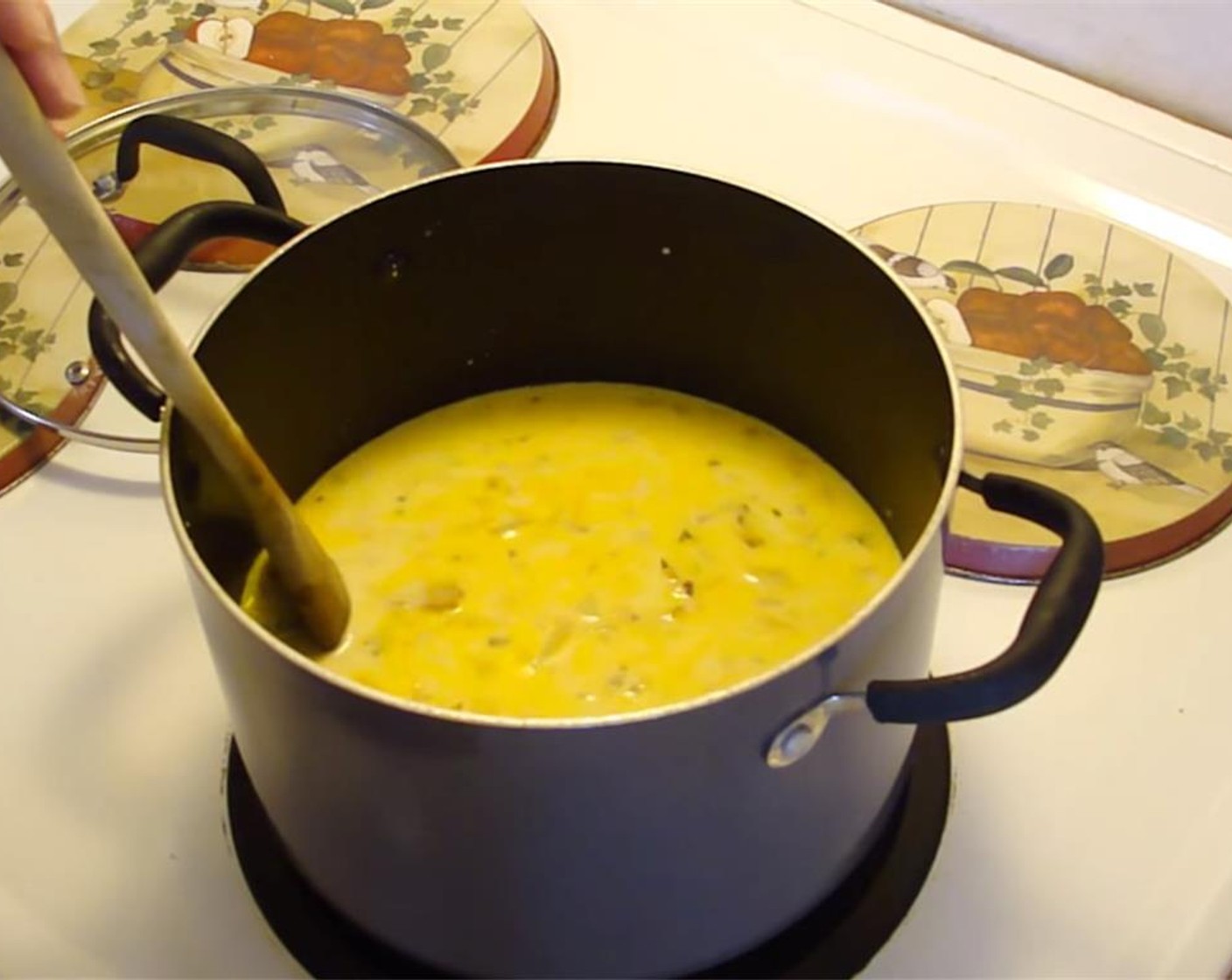 step 5 In a large bowl, combine All-Purpose Flour (3 Tbsp) and Milk (3 cups) until smooth. Add to soup. Bring to a boil, and then simmer for 2 minutes while stirring.