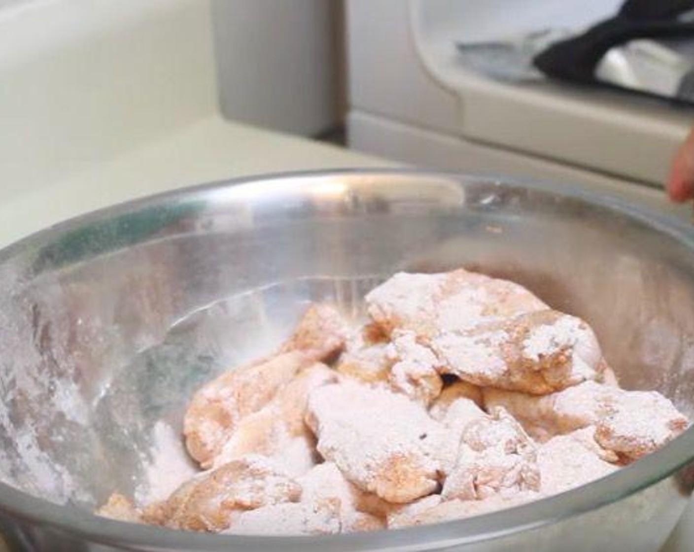 step 3 In a large bowl, toss the Chicken Wings (2 lb) with Baking Powder (1 Tbsp), Paprika (1 tsp), McCormick® Garlic Powder (1/2 Tbsp), Onion Powder (1/2 Tbsp) and Salt (to taste) and Ground Black Pepper (to taste). Place wings on the rack in single layer and cook for 50-60 minutes until brown and crispy.