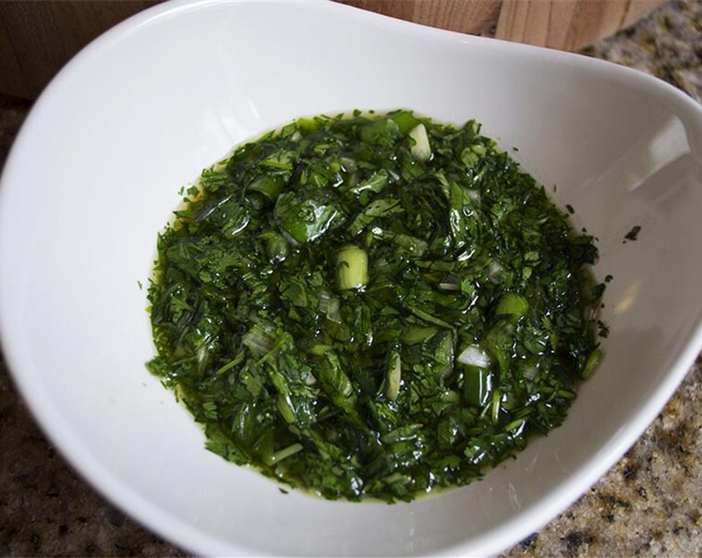 step 4 Combine Granulated Sugar (1 Tbsp), lime juice, Fish Sauce (1 Tbsp), chopped scallions, chopped cilantro, and thai basil in the bowl with the lime juice. Set aside.